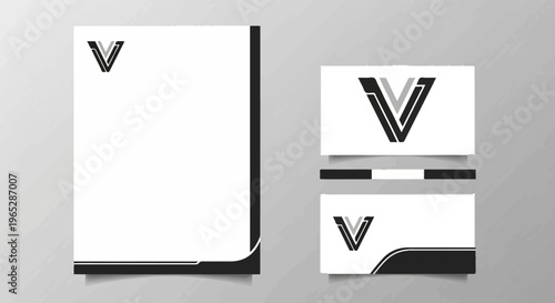 Modern stationery set with stylized letter 'V' logo, clean design