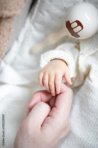 Wallpaper Mural Close-up of Newborn Baby Touching Parent's Finger Torontodigital.ca