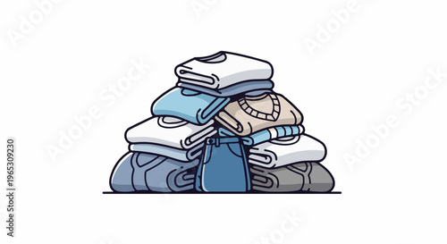 Stacked folded clothes with blue jeans in front