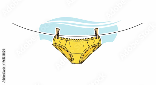 A pair of yellow lace-trimmed underwear hangs on a clothesline