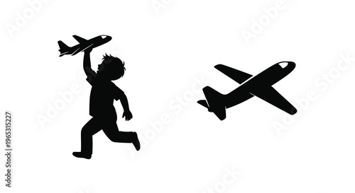 A child playfully throws a toy plane with an airplane flying nearby silhouette