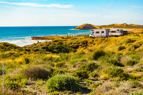 Camper rv camping on sea shore, Spain