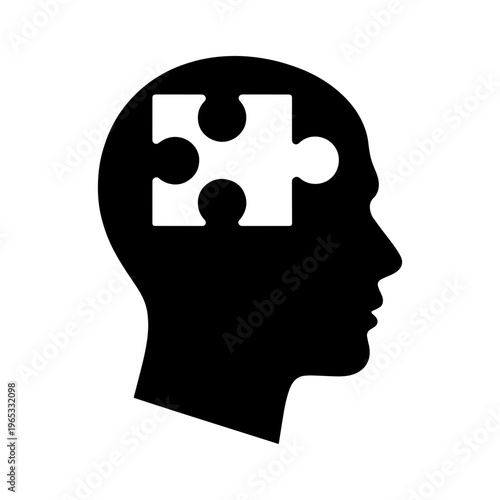 A black silhouette of a human head with a puzzle piece in the brain represents a concept of problem solving and mental health