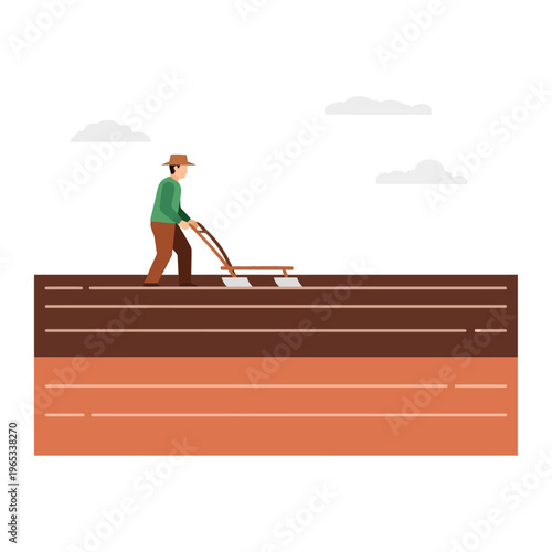 Farmer cultivating field with a hoe on brown earth under a cloudy sky