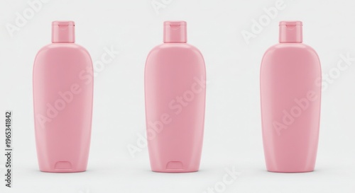 Three pink lotion bottles isolated on white background