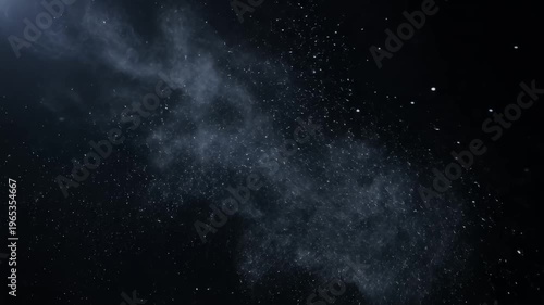 White powder explosion spreading on a dark black background