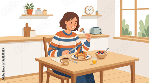 A young woman enjoys a healthy breakfast of pancakes, berries, and juice in a bright, modern kitchen setting, conveying a feeling of comfort and well-being.