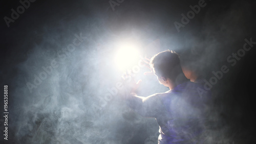 Search for truth: hand stretching to luminous beam