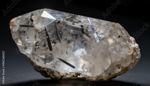 Rutilated quartz crystal with black needle inclusions
