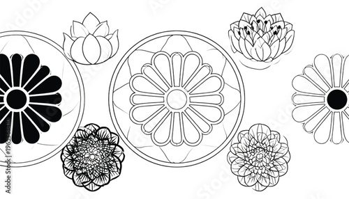 Delicate black and white floral patterns scattered across a surface