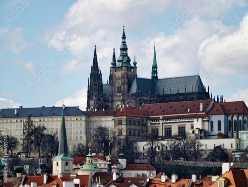 Ancient buildings on skyline. City landscape showcasing historic cathedrals and towering fortresses