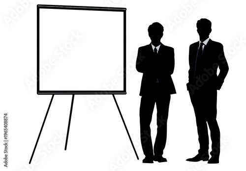 Silhouetted business people in formal attire stand near a blank presentation board