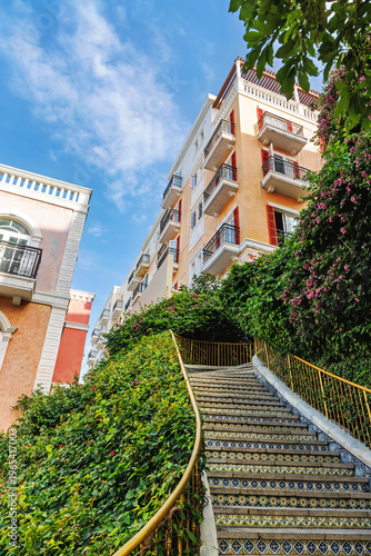Close-Up of Curved Tiled Staircase in Sunset Town