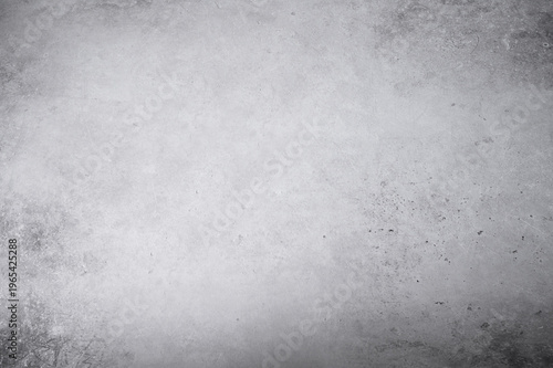 A blank gray concrete texture in a loft-style setting against a neutral background.