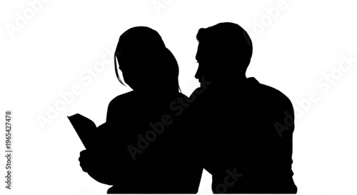 Silhouette of a man and woman looking at a document