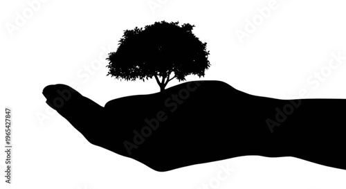 A hand cradling a small tree silhouette