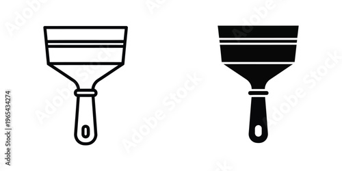Comparison of a standard trowel and a black rubberized putty knife