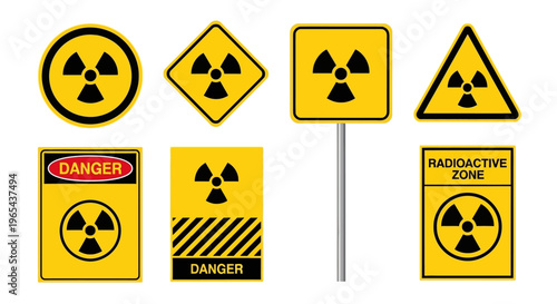 A collection of warning signs displaying radiation symbols in various shapes and labels.