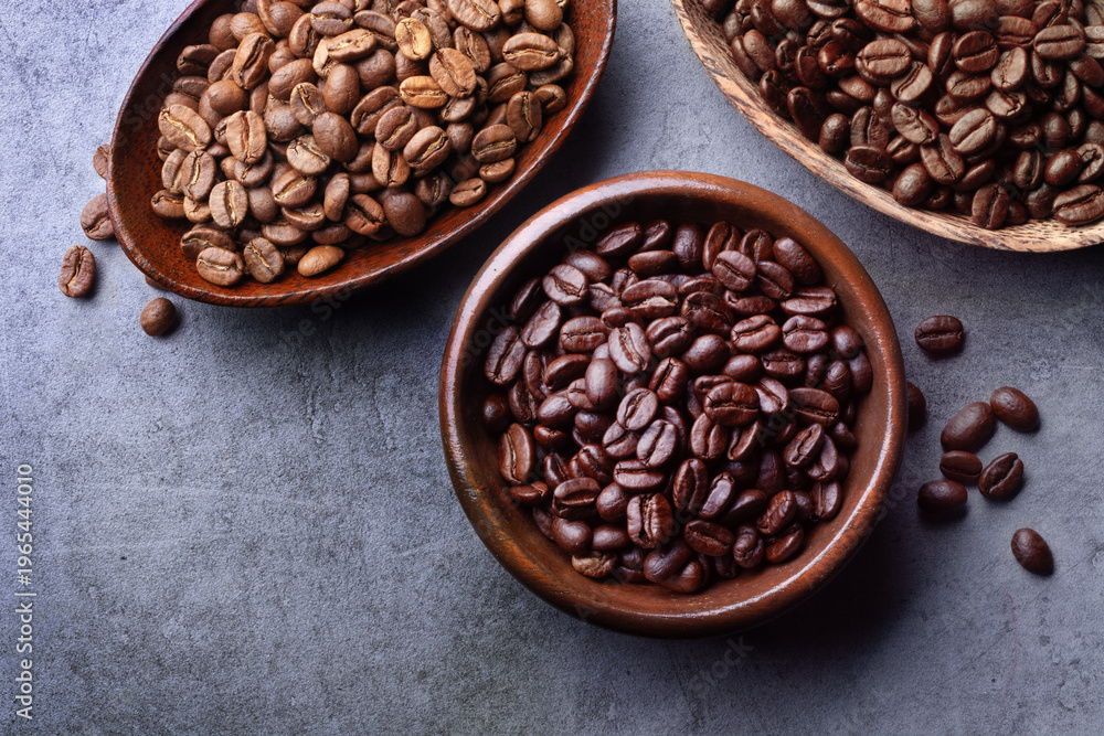 Fototapeta premium various coffee beans in wooden bowls
