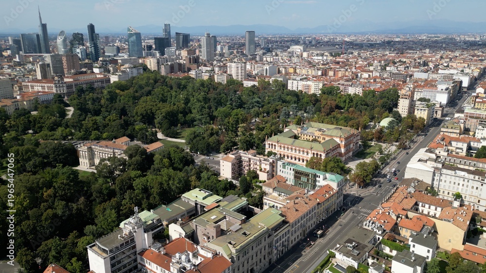 Fototapeta premium Europe, Italy, MIlan 03,30,2026 drone aerial view of Milan downtown fashion district , Corso Venezia , natural history museum and new skyline with skyscrapers in Gea Aulenti Garibladi