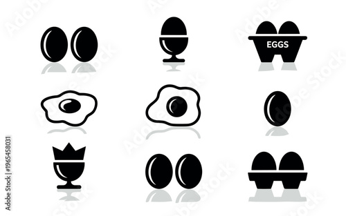 Black and white egg icons set with microphone cooking hat and fried egg design vector illustration