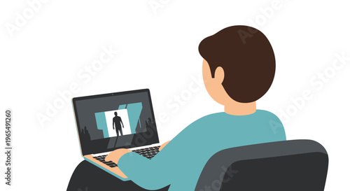 Back view of a young man using a laptop computer to watch a movie or play video games