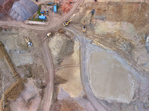 Aerial View of Construction Site with Excavators and Heavy Machinery