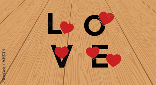 Bold black letters spelling "LOVE" with red hearts decorating them on a wooden background