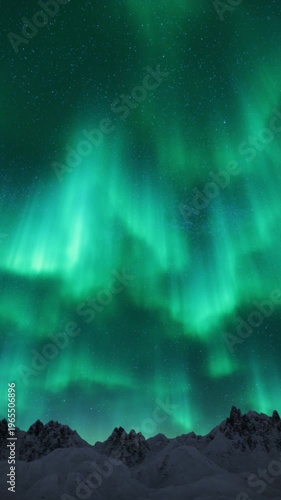 Wallpaper Mural Mesmerizing aurora borealis dances above majestic snowy mountain range Torontodigital.ca