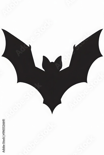 A black silhouette of a bat in flight