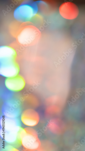 Abstract blurred background with colorful bokeh lights creating a festive atmosphere