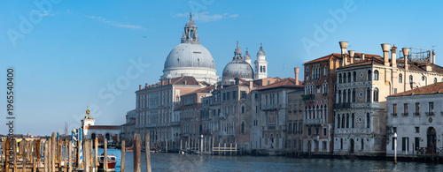 Morning light over historic domes and Venetian canal