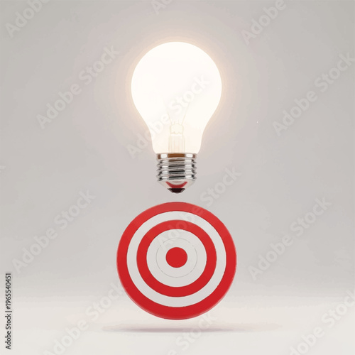 Idea and focus concept: illuminated light bulb above a red bullseye target symbol.