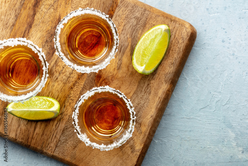 Wallpaper Mural Tequila shots with salted rims and lime slices, overhead flat lay shot with copy space Torontodigital.ca