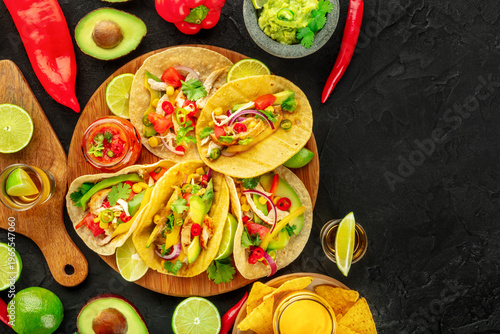 Wallpaper Mural Mexican food. Tacos, tequila, nachos, guacamole, overhead flat lay shot on a black background, with copy space Torontodigital.ca