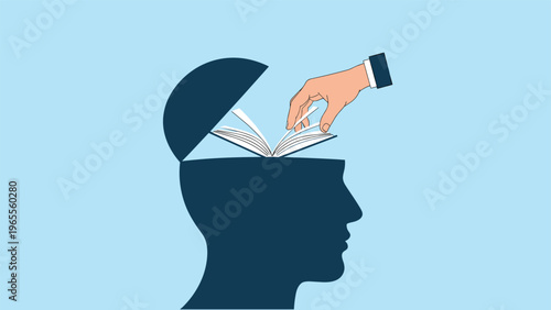 Human head silhouette with an open lid while a hand turns the pages of a book inside representing learning, education, and knowledge.