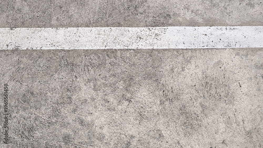 Fototapeta premium Concrete floor with white line, minimal urban background with copy space