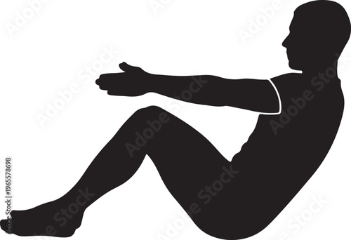 A man sitting on the floor with his legs bent