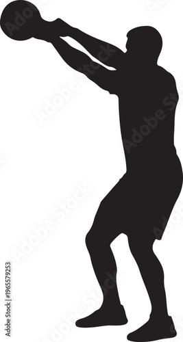 A man in silhouette is lifting a kettlebell