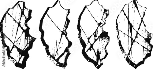 Ancient flint arrowheads set with visible sharp edges and cracks, prehistoric hand tools for hunting and cutting