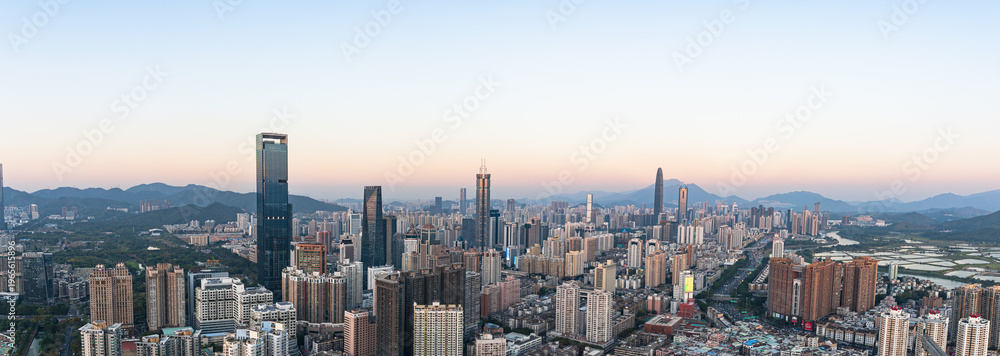 Fototapeta premium The skyline of Futian District, Shenzhen at dusk