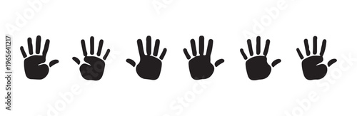 Collection of black handprints on white background with fingers spread wide