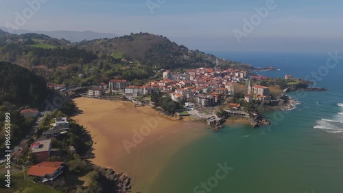 Drone flight around Mundaka on a sunny day near the end of Winter