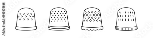 Collection of four different thimbles for sewing and crafting projects