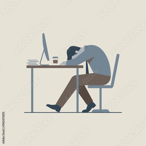 Man slumped over desk at work with computer and coffee cup