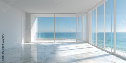 Modern, sunlit interior space with large windows overlooking a tranquil, blue ocean. Marble floors reflect light