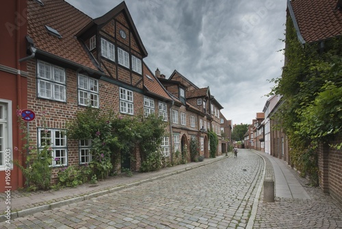 Alley with cobblestones, Old Town, Lüneburg, Lower Saxony, Germany