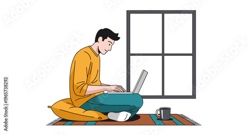 Man working on laptop sitting on floor near window