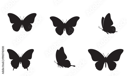 Set of six black butterfly silhouettes in different poses and angles, isolated on a white background, symbolizing nature, freedom, and delicate beauty.