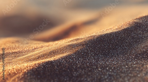 Golden desert sand dunes glowing at sunset with abstract texture.
